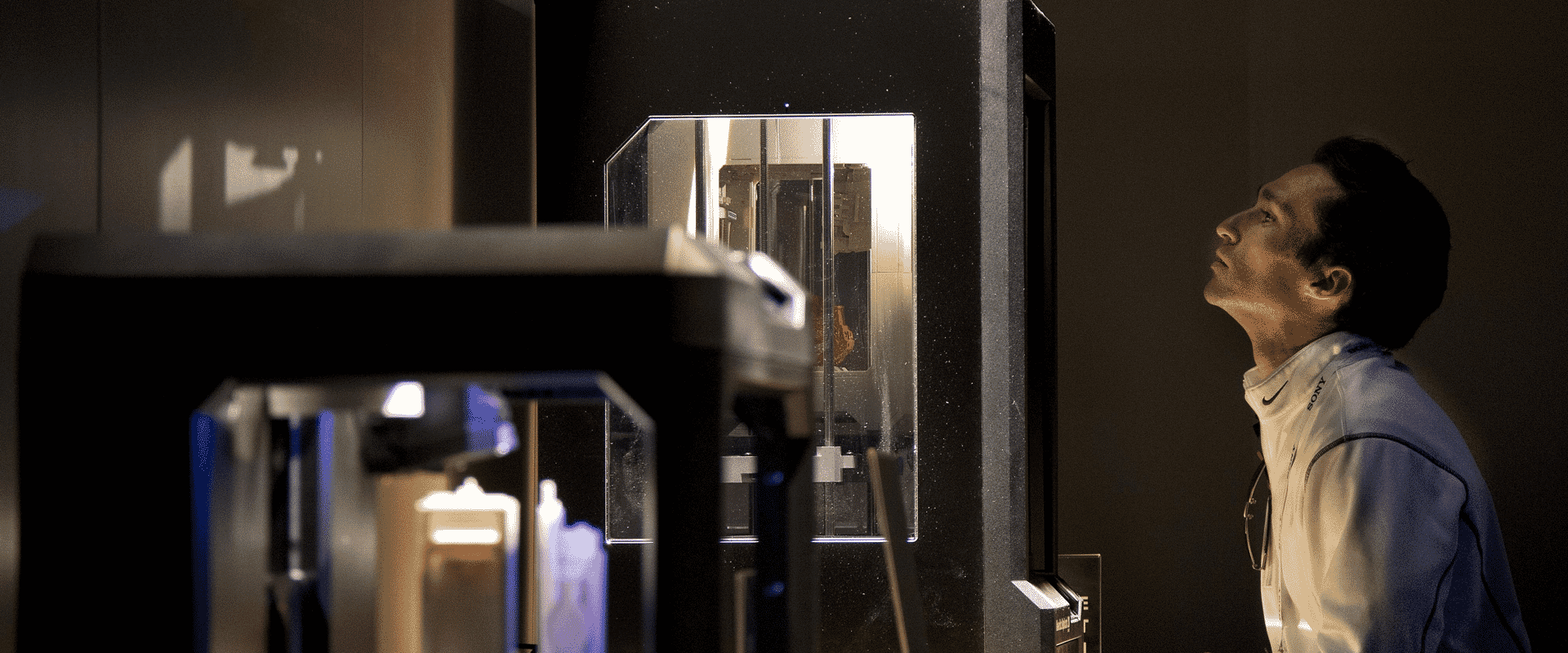 Man looking into 3D Printer at 3D Print Academy